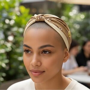 Elegant floral headband with a gold Tan cream soft, pleated fabric. NEW